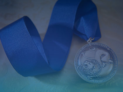 A photo of a Schreyer Honors College medal