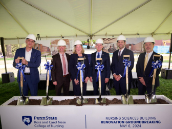University and construction leadership line up to break ground with their shovels at the Groundbreaking event.
